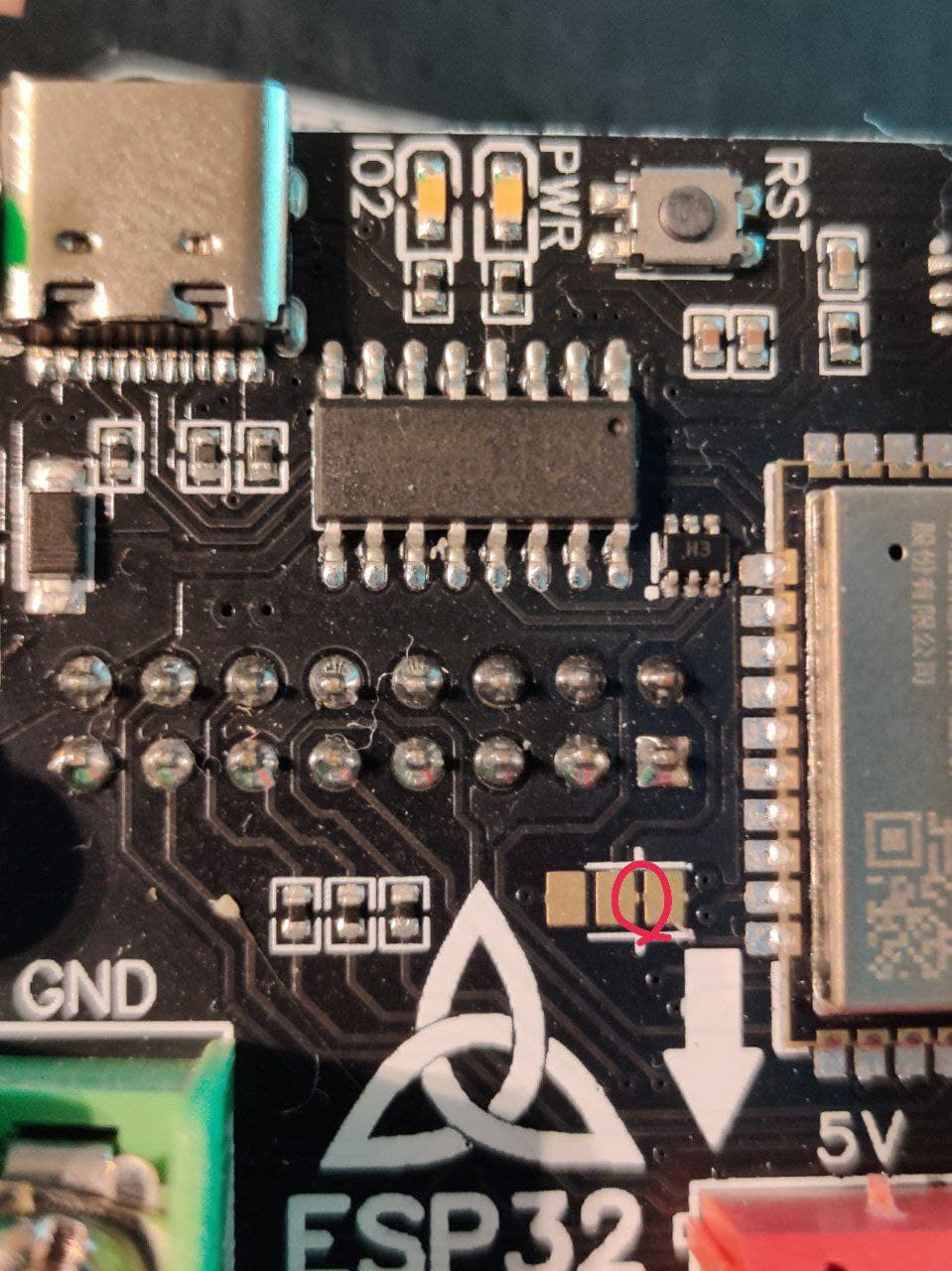 Picture showing gap of the right two of the three solder pads circled